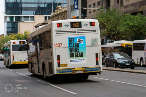 Bus that says "get clear while on gear"