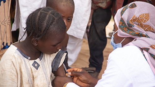 Child being immunised