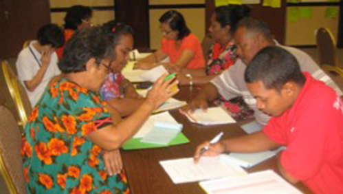 Many of the planning processes were fun. Others required more hard work on specific issues. This is a working group in the Marshall Islands, developing ideas on what to include in their plan.